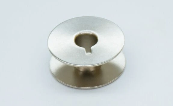 Handi Quilter Metal Bobbins, Set Of 4 (HQ Stitch 510) 3 Handi Quilter Metal Bobbins, Set Of 4 (HQ Stitch 510)